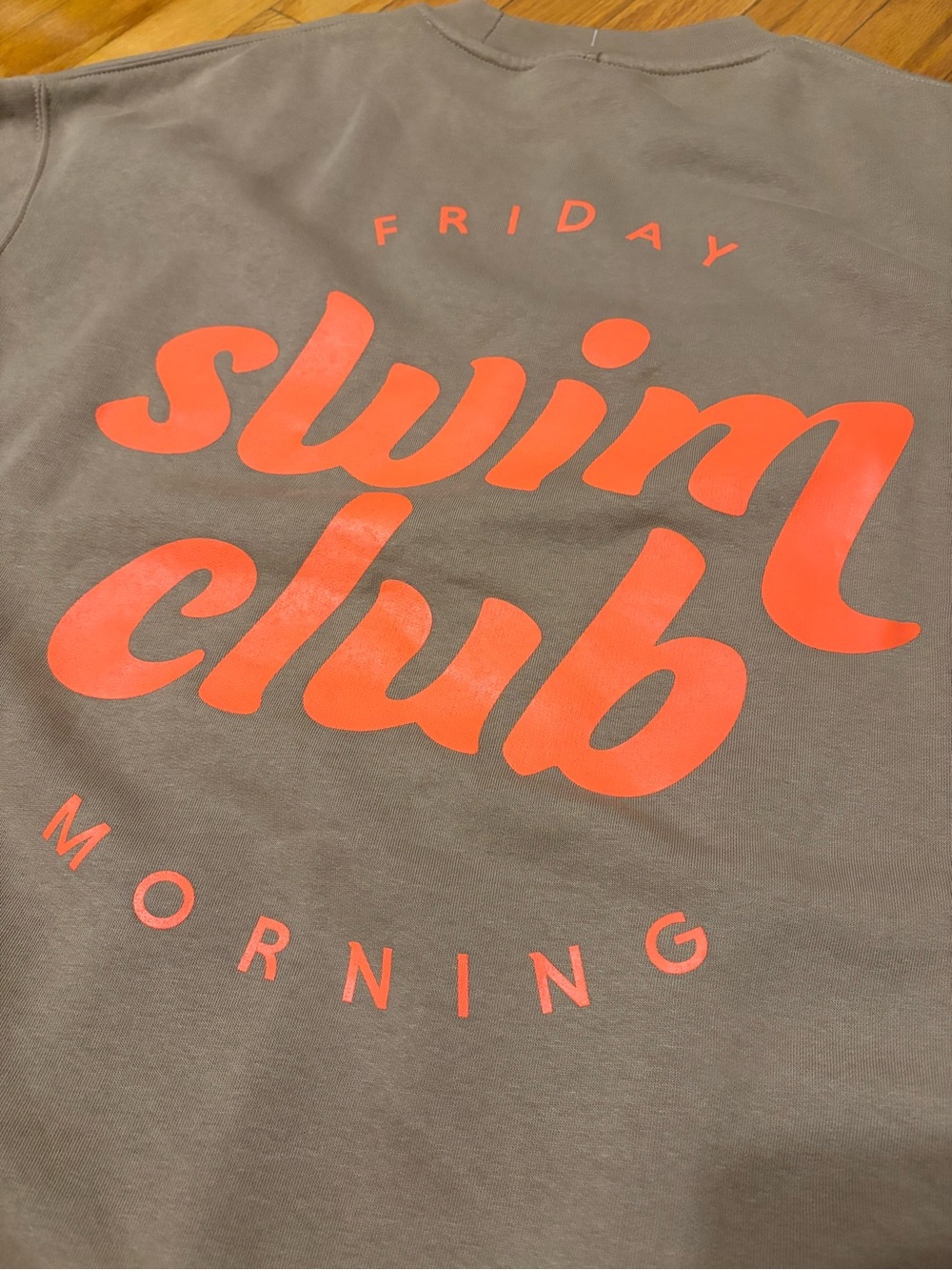 Women’s Crewneck Sweatshirt — Taupe with Coral Graphic
